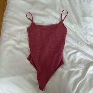 Babaton Aritzia bodysuit in pink with thin straps